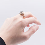 18k two-tone gold ring with central brilliant cut diamond (0.28 ct), 30s