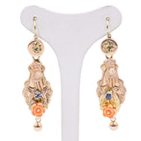 Bourbon earrings with articulated hand in 14k yellow gold with corals and sapphires, second half of the 800th century
