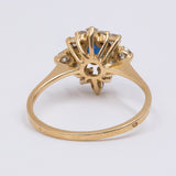 Vintage-Ring aus 18 Karat Gelbgold mit zentralem Saphir und Diamanten (0.50 ctw), 70er Jahre