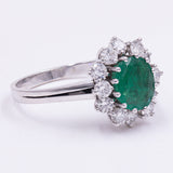 18kt gold daisy ring with emerald (2.20ct) and diamonds (1ct), 60s
