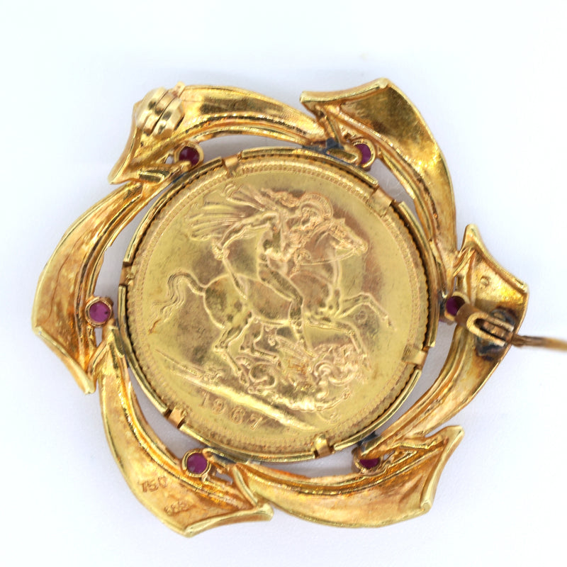 Broche vintage en or 18 carats avec livre sterling en or 24 carats et rubis. fin des années 60