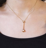 Collar vintage de oro de 14 quilates con perla y diamante talla antigua (0.50 ct aprox.), años 50