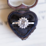Daisy ring with central pink coroné cut diamond and brilliant cut diamonds