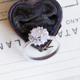 Daisy ring with central pink coroné cut diamond and brilliant cut diamonds