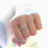 Daisy ring with central pink coroné cut diamond and brilliant cut diamonds