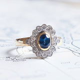 Vintage 18K gold ring with central sapphire and brilliant cut diamonds (0.45ctw approx.), 70s