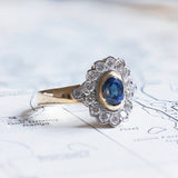 Vintage 18K gold ring with central sapphire and brilliant cut diamonds (0.45ctw approx.), 70s