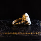 Vintage 18K gold ring with cabochon cut opal (approx. 5ct) and brilliant cut diamonds (approx. 0.20ctw), 60s / 70s