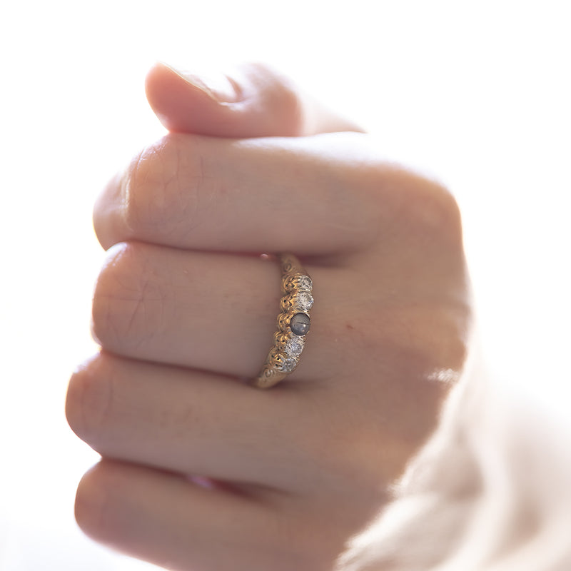 Antique 14K gold riviera ring with black bead and old cut diamonds (0.20ctw approx.), Early 1900s