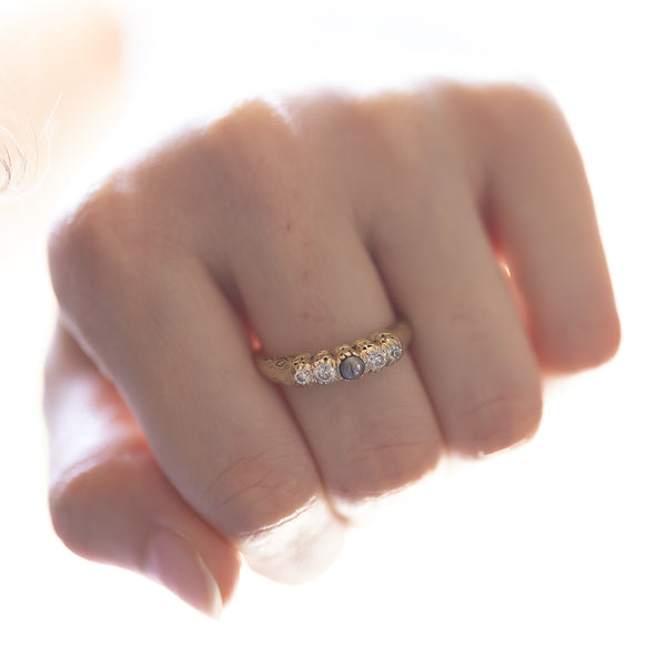 Antique 14K gold riviera ring with black bead and old cut diamonds (0.20ctw approx.), Early 1900s