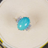 Ring aus 18 Karat Weißgold mit zentralem Türkis und Diamanten im Brillantschliff (0.50 ct) - Antichità Galliera