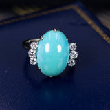 Ring aus 18 Karat Weißgold mit zentralem Türkis und Diamanten im Brillantschliff (0.50 ct) - Antichità Galliera