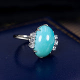 Ring aus 18 Karat Weißgold mit zentralem Türkis und Diamanten im Brillantschliff (0.50 ct) - Antichità Galliera