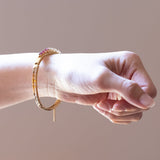 Starres Armband aus 14 K Gold mit Diamanten (ca. 1.40 ctw) und Rubinen (ca. 1.30 ctw), 1950er Jahre