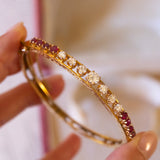 Starres Armband aus 14 K Gold mit Diamanten (ca. 1.40 ctw) und Rubinen (ca. 1.30 ctw), 50er Jahre