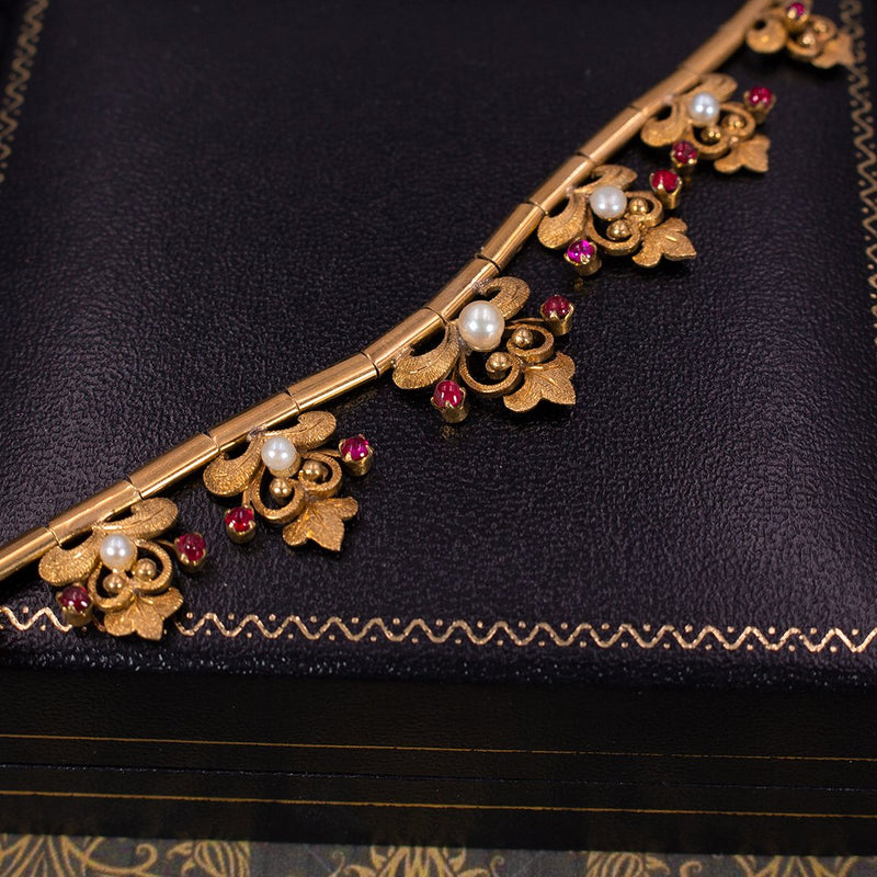 Collier vintage in oro 18K, con rubini e perline, anni '60 - Antichità Galliera