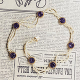 Vintage necklace in 18K gold with beads and purple sapphires, 50s - Antichità Galliera