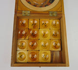 Scatola in legno dipinta contenente Roulette e "Gioco del quindici" , primi del '900 - Antichità Galliera