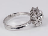 Vintage Ring aus 18 Karat Weißgold mit zentralem Diamanten von 0.30 Karat und seitlichen Diamanten, 50er Jahre