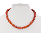 Vintage red coral ball necklace with 14k gold clasp