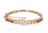 Pulsera vintage de oro de 14 quilates con diamantes (1.40 quilates aprox.) y rubíes (1.30 quilates aprox.), años 50