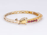 Pulsera vintage de oro de 14 quilates con diamantes (1.40 quilates aprox.) y rubíes (1.30 quilates aprox.), años 50