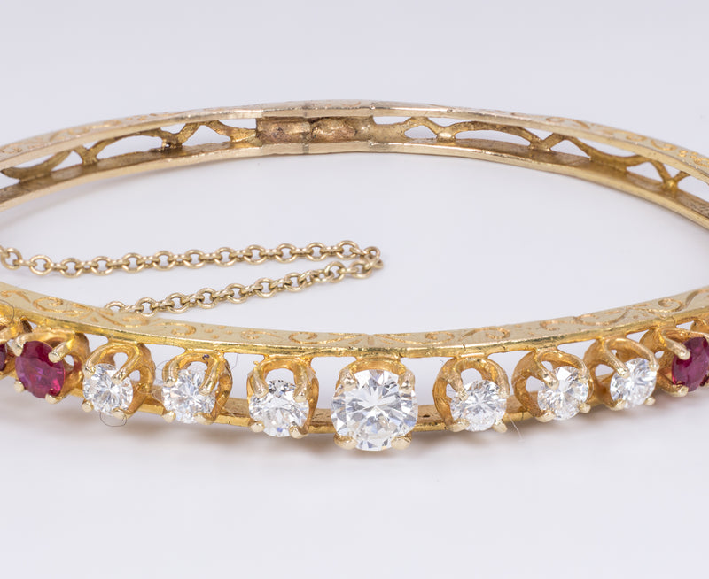 Braccialetto vintage in oro 14K con diamanti (1.40ctw ca.) e rubini (1.30ctw ca.), anni '50