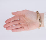 Pulsera vintage de oro de 14 quilates con diamantes (1.40 quilates aprox.) y rubíes (1.30 quilates aprox.), años 50