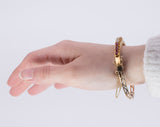 Pulsera vintage de oro de 14 quilates con diamantes (1.40 quilates aprox.) y rubíes (1.30 quilates aprox.), años 50