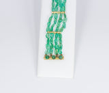 Bracelet en or 18 carats et émeraudes, années 1960