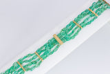 Bracelet in 18k gold and emeralds, 60s