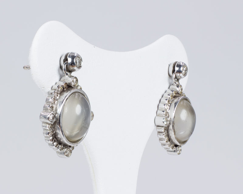 18k gold earrings with diamonds and moonstones
