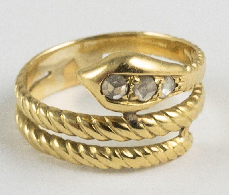 Anello in oro a forma di serpente con rosette di diamante , anni '60 - Antichità Galliera