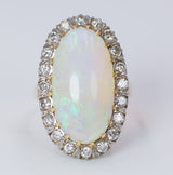 Vintage Ring aus 18 Karat Gold mit australischem Opal und Diamanten im Brillantschliff (0.80 ct), 50er Jahre