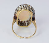 Vintage ring in 18k gold with Australian opal and brilliant cut diamonds (0.80 ct), 50s