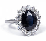 Vintage 18k white gold ring with central sapphire and side brilliant cut diamonds (approx. 1ct), 60s Antichità Galliera