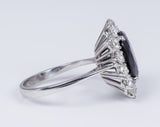 Vintage 18k white gold ring with central sapphire and side brilliant cut diamonds (approx. 1ct), 60s Antichità Galliera