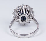 Vintage 18k white gold ring with central sapphire and side brilliant cut diamonds (approx. 1ct), 60s Antichità Galliera