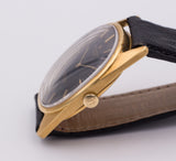 Orologio vintage Universal Geneve "GoldenShadow" automatico in oro 18k. Anni 50