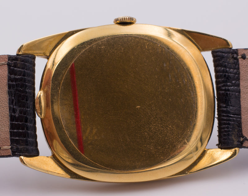 Universal Geneve "GoldenShadow" automatic vintage watch in 18k gold. 1950s