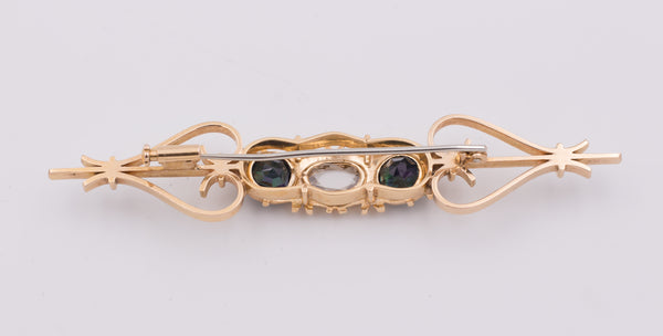 Antique gold brooch with central diamond and sapphires, 1920s