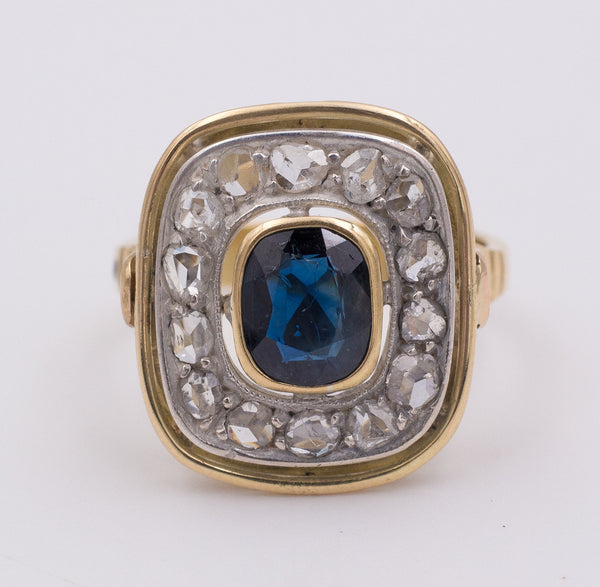 Vintage gold ring with rosette cut diamonds and central sapphire, 1950s