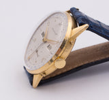 Movado Vintage Uhr mit vollem Kalender, 18 Karat Gold. 1950