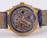 Orologio vintage Movado con calendario completo, oro 18k . 1950