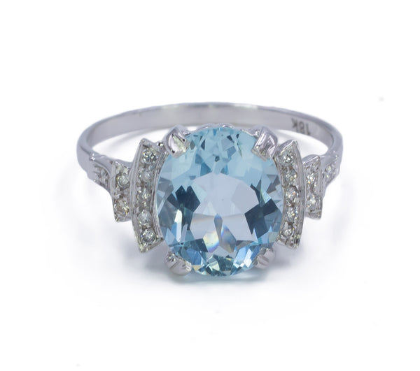 Gold ring with diamonds and aquamarine