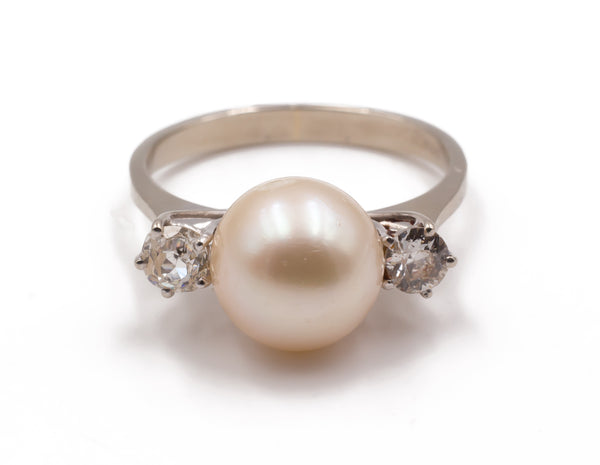 Vintage white gold ring with pearl and diamonds, 1950s