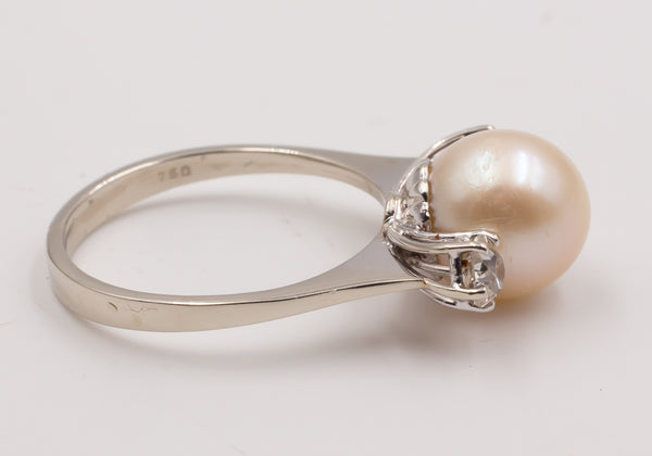 Vintage white gold ring with pearl and diamonds, 1950s