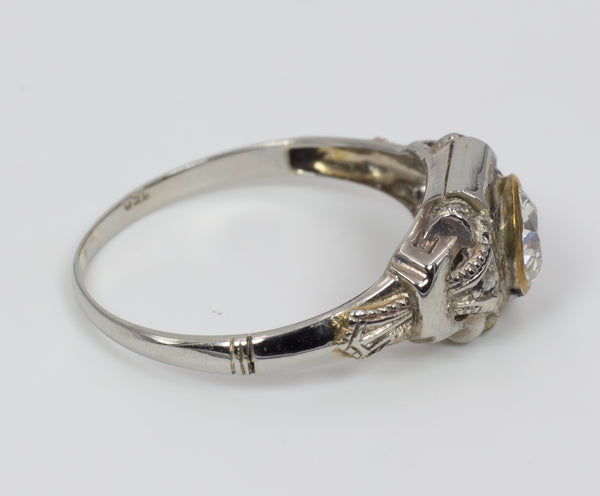 Gold solitaire ring with central diamond, 1930s