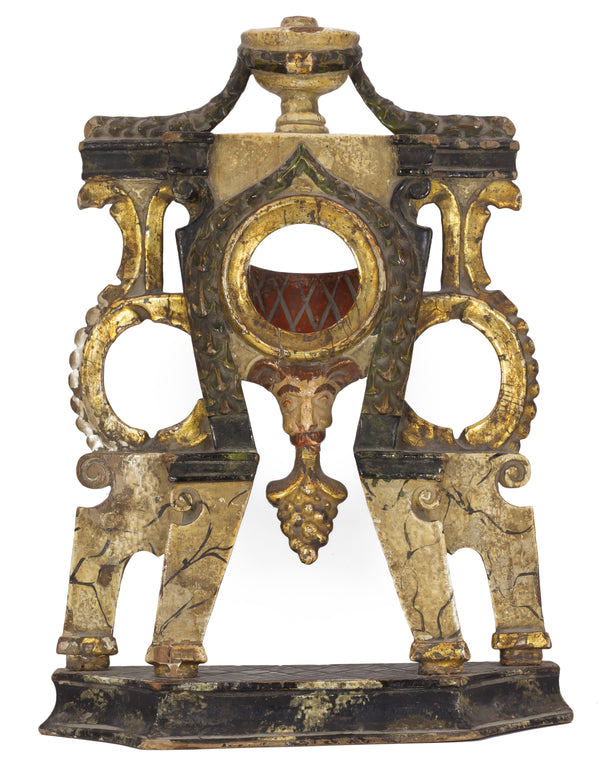 Clock holder in gilded and lacquered wood. Early 19th century