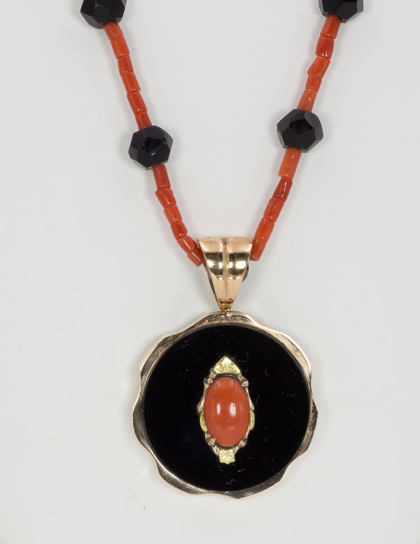 Coral, onyx and 9k gold necklace with pendant, early 1900s